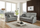 Graues 3er-Sofa Beldomo ZARA in modernem Wohnzimmer, seitliche Perspektive