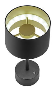 Moderne Akku-Tischleuchte in Schwarz und Gold, von oben betrachtet, mit rundem Sockel und Schalter.