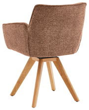 Rückansicht eines braunen Armlehnstuhls mit Holzbeinen, Perspektive von hinten.