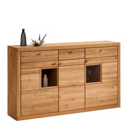 Hochwertiges Highboard aus Holz mit mehreren Schubladen und Glaseinsätzen, frontal betrachtet.