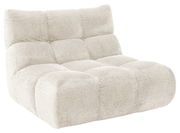 Beiges, modernes 1,5er Sofa ohne Armlehnen mit weichem, gepolstertem Design, seitliche Perspektive