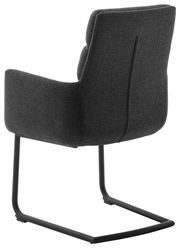 Rückansicht eines modernen Freischwinger-Sessels mit dunklem Stoffbezug und schwarzem Metallgestell.