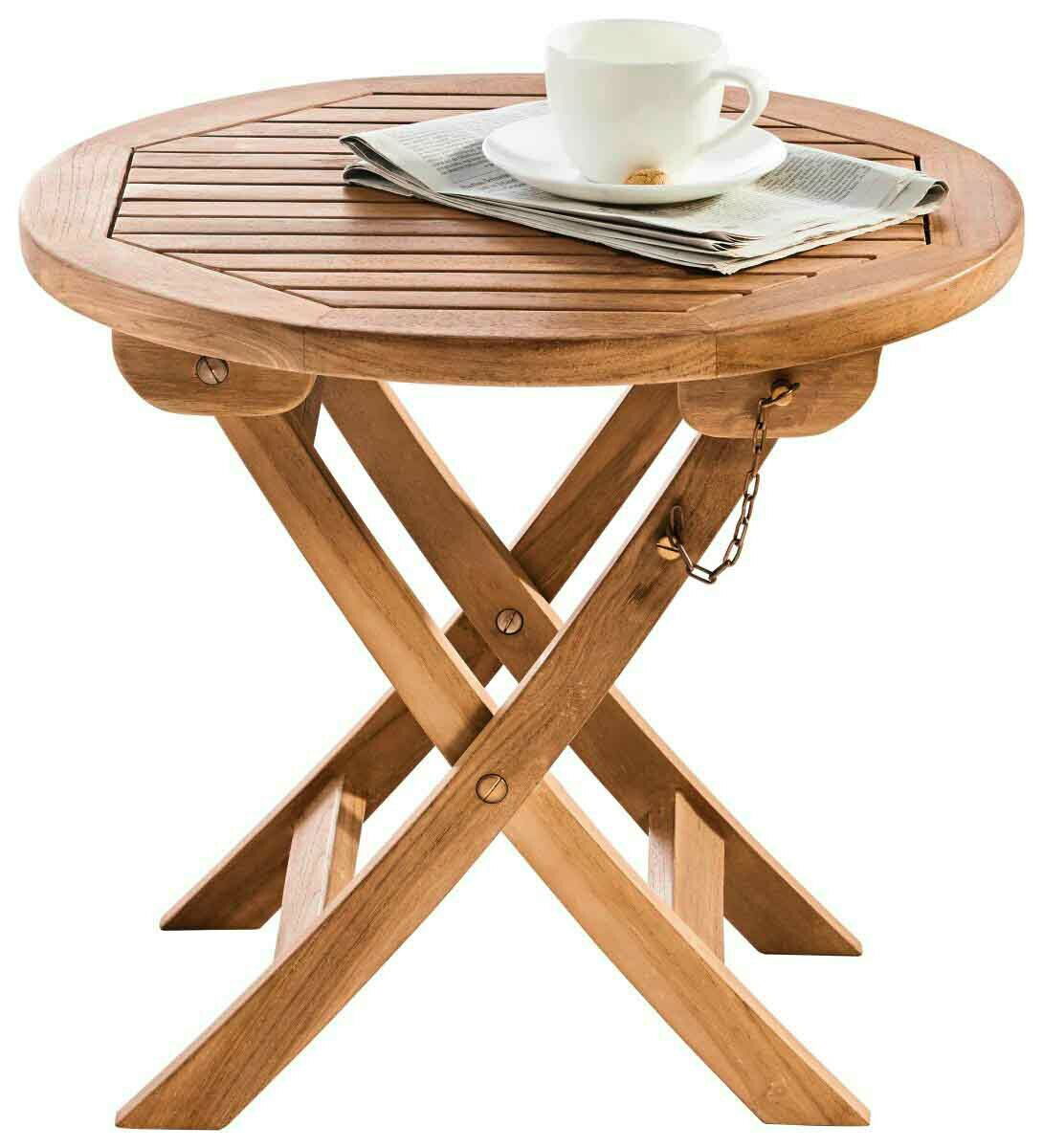 Runder Klapptisch aus Holz mit einer Tasse und Zeitung darauf, seitliche Perspektive