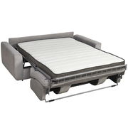 Graues Funktionssofa in ausgeklappter Position, von vorne betrachtet, mit sichtbarer Matratze.