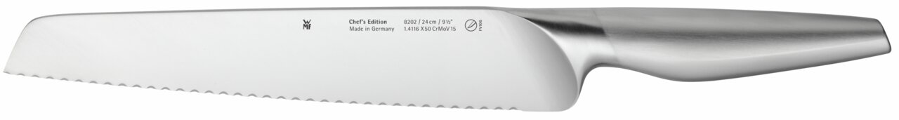 Seitliche Ansicht eines hochwertigen Küchenmessers der Chef's Edition mit Wellenschliff, hergestellt in Deutschland.