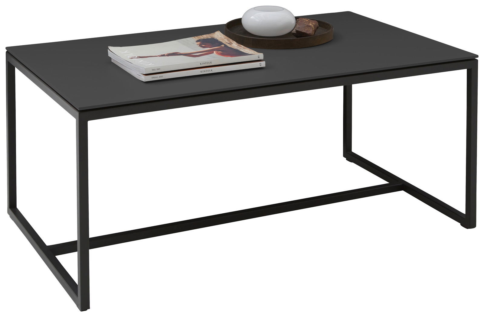 Dieter Knoll Couchtisch RINA Moderner Couchtisch mit schwarzer Tischplatte und schlankem Metallgestell, seitliche Perspektive.