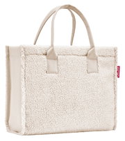 Beige shopper van zacht, donzig materiaal met twee handvatten, zijaanzicht