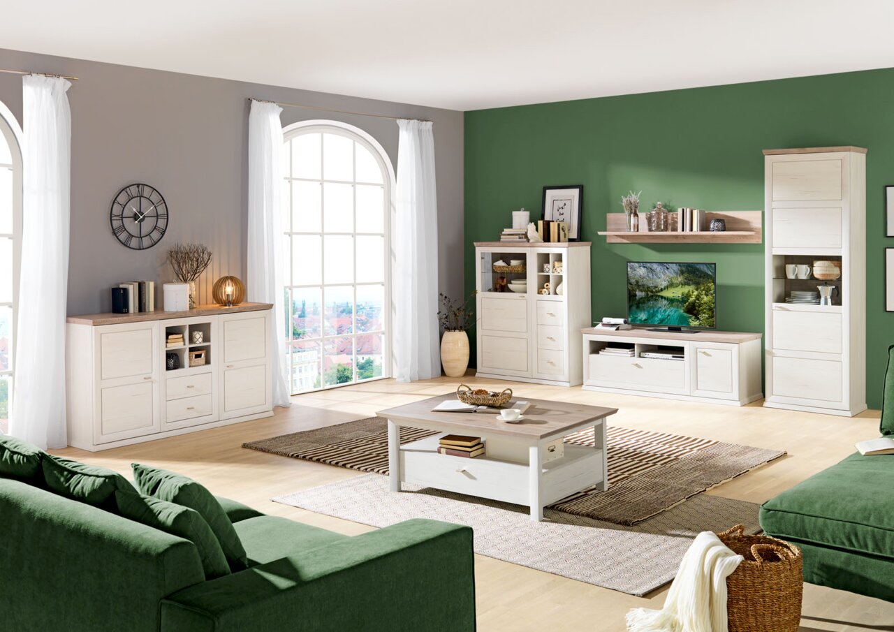 Woonkamer met moderne wandmeubel, dressoir en salontafel in lichte houtlook, gezien van voren