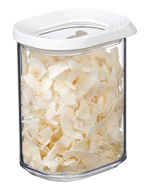 Bewaarpot Modula Mini 375 ml met wit deksel, gevuld met kokosvlokken, gezien vanaf de zijkant