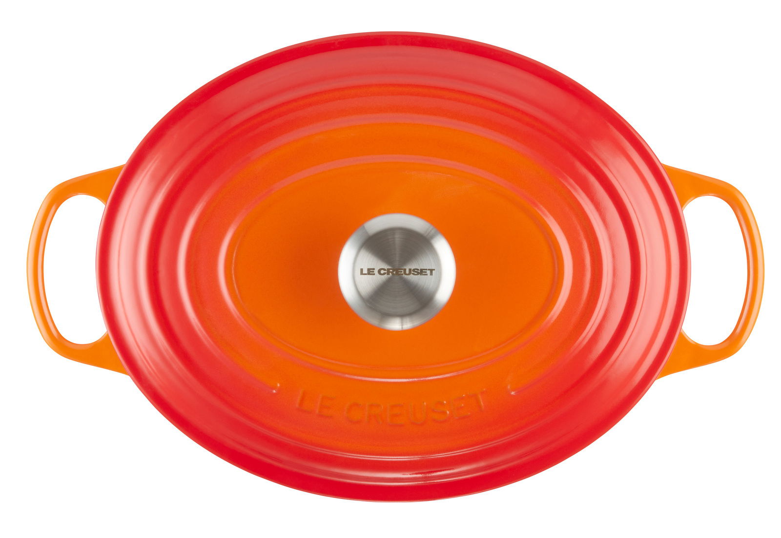 Vogelperspektive auf einen ovalen, ofenroten Bräter mit zwei Griffen und einem silbernen Knauf auf dem Deckel.