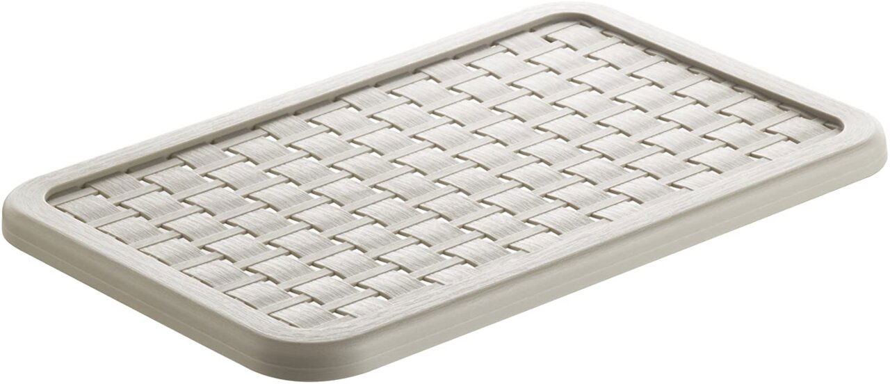 Rechteckiger Deckel mit geflochtenem Muster, in schräger Perspektive von oben fotografiert.