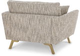 Rückansicht eines Sessels mit beige-gemustertem Stoffbezug und Holzbeinen.