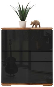 Modernes Highboard mit dunkler Front, Holzoberfläche, dekoriert mit einer Pflanze und einer Holzfigur, Frontalansicht.
