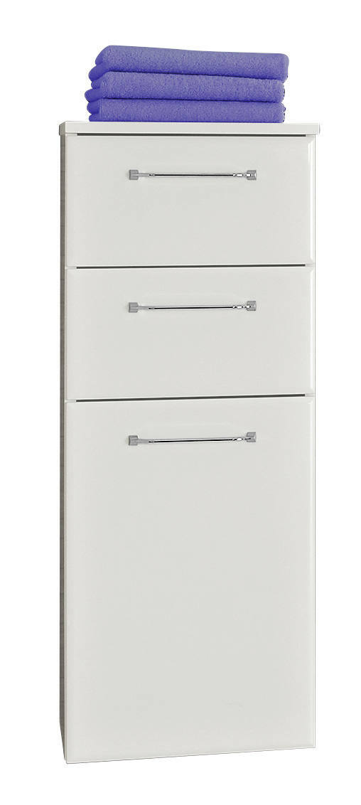 Weißes Highboard mit drei Schubladen und lila Handtüchern oben, Frontalansicht
