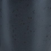 Nahaufnahme der grauen Oberfläche des Kombisets Sören mit gesprenkeltem Muster.