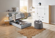 Boxspringbett mit Stauraum in modernem Schlafzimmer, seitliche Perspektive