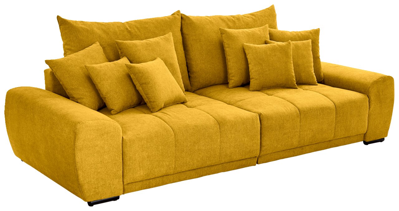 Großes, senfgelbes Sofa mit mehreren Kissen, seitliche Perspektive