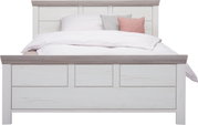 Frontale Ansicht eines Bettes 140x200 cm mit hellem Holzdesign und dekorativen Kissen.