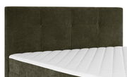 Boxbett mit gepolstertem Kopfteil in dunklem Stoff, seitliche Perspektive