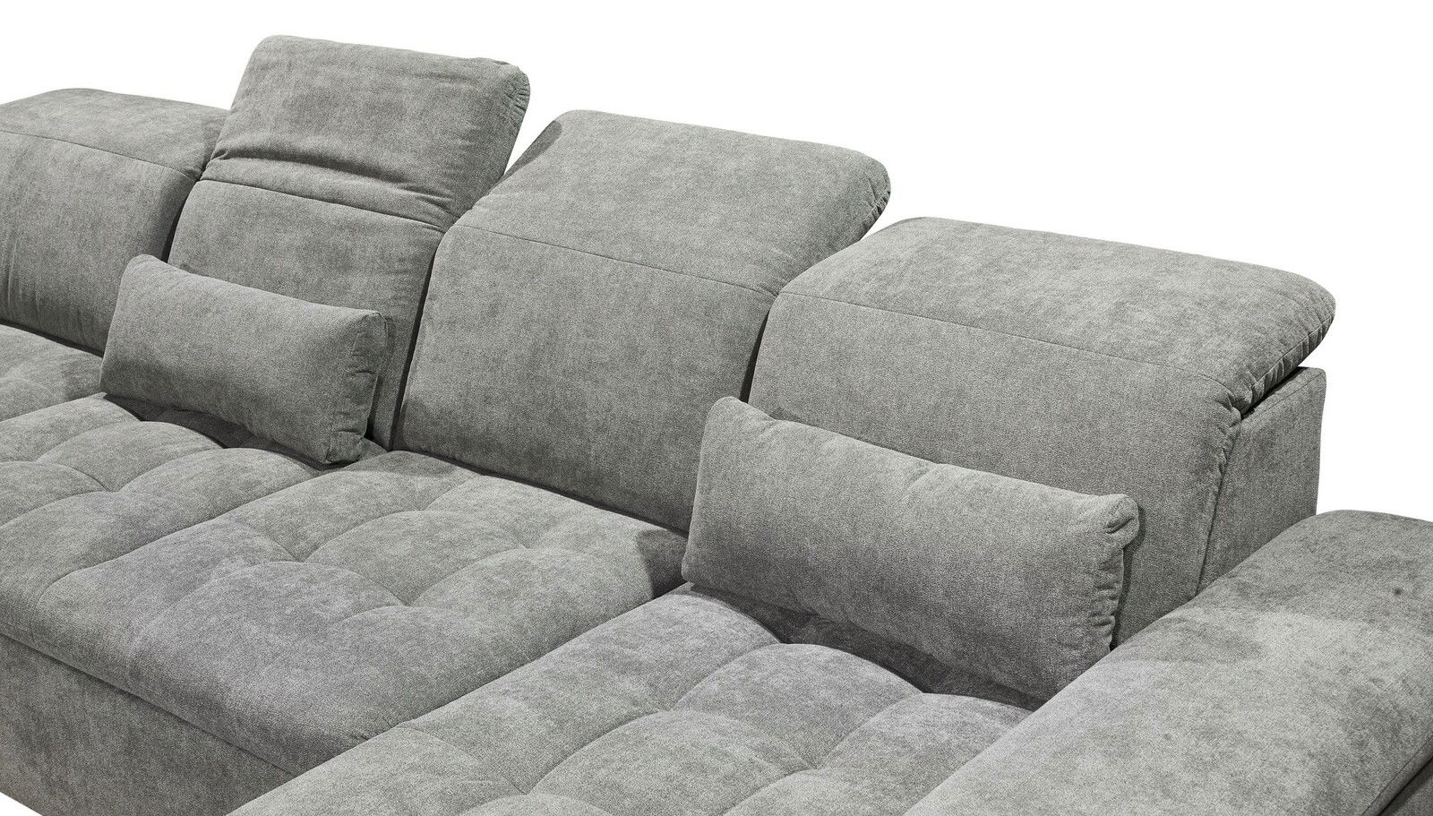 Graues Sofa mit verstellbaren Kopfstützen und Kissen, seitliche Perspektive