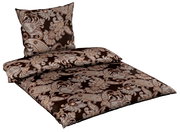 Bettwäsche-Set mit elegantem Paisley-Muster in Braun- und Beigetönen, bestehend aus einem Kissenbezug und einem Bettdeckenbezug, aus der Vogelperspektive.