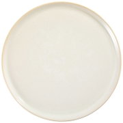 Rond crèmekleurig bord met subtiel gespikkeld glazuur en een lichtbeige rand, van bovenaf gezien
