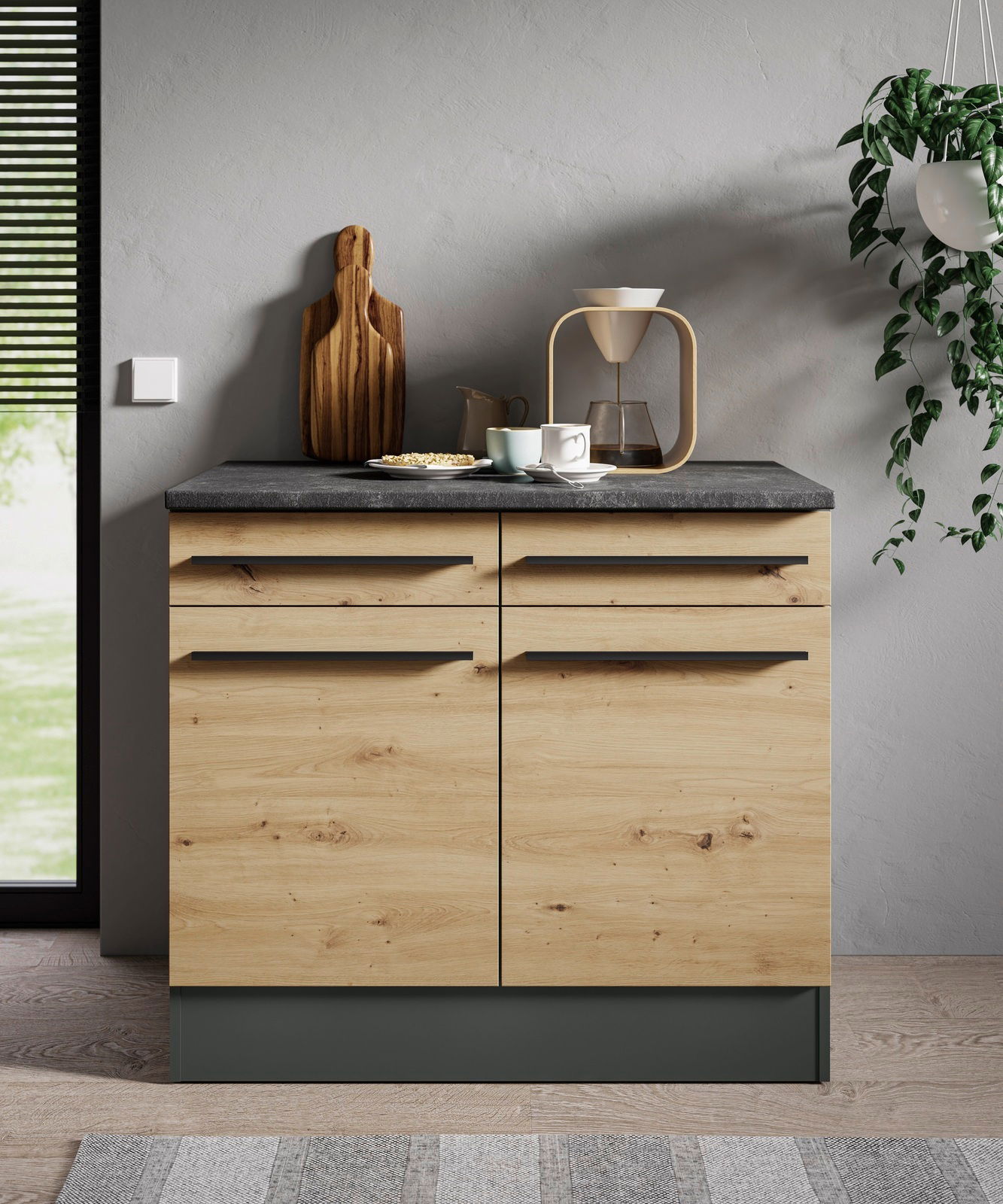 Moderner Unterschrank aus Holz mit vier Schubladen, grauer Arbeitsplatte und stilvollen Griffen, frontal abgebildet.