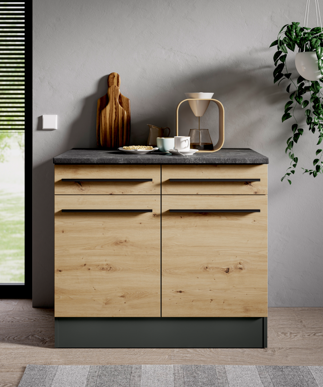 Moderner Unterschrank aus Holz mit vier Schubladen, grauer Arbeitsplatte und stilvollen Griffen, frontal abgebildet.