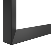 Nahaufnahme einer schwarzen Tischkante in perspektivischer Ansicht