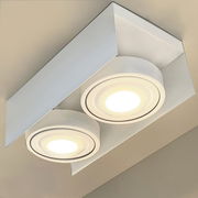 Moderne LED Aufbauleuchte mit zwei runden Lichtquellen, von unten betrachtet.