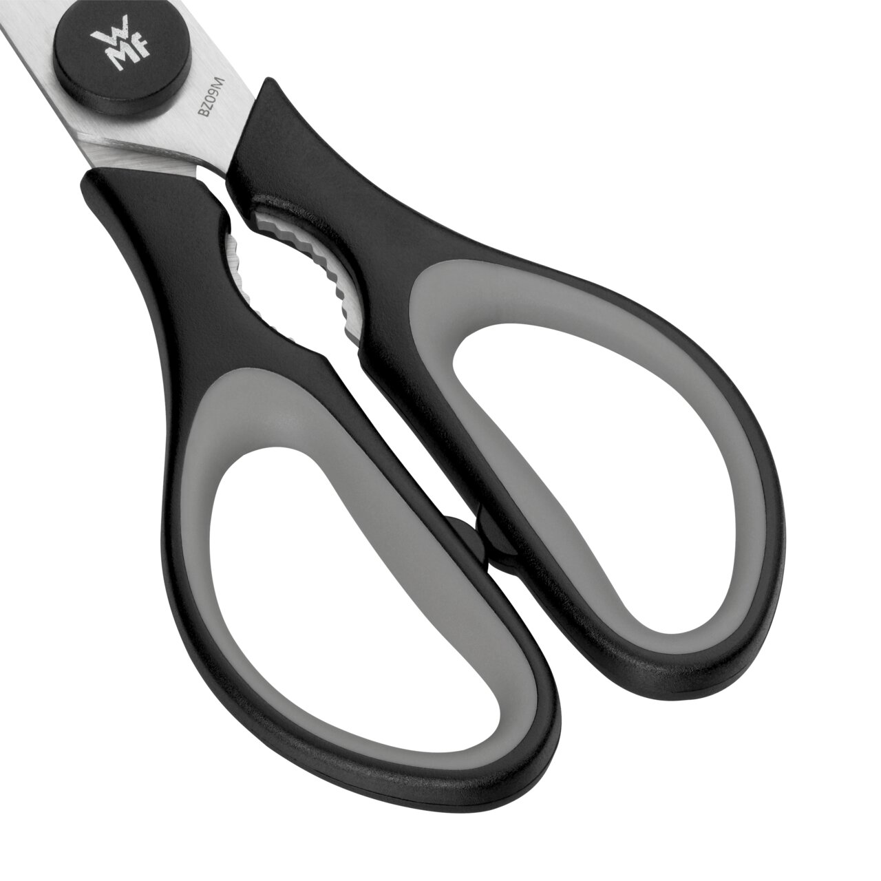 Nahaufnahme einer schwarzen Küchenschere mit ergonomischen Griffen, von oben betrachtet.