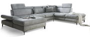 Graues Ecksofa mit verstellbaren Kopfstützen und Kissen, von vorne links gesehen, mit einer Tasse und Zeitschrift auf der Sitzfläche.