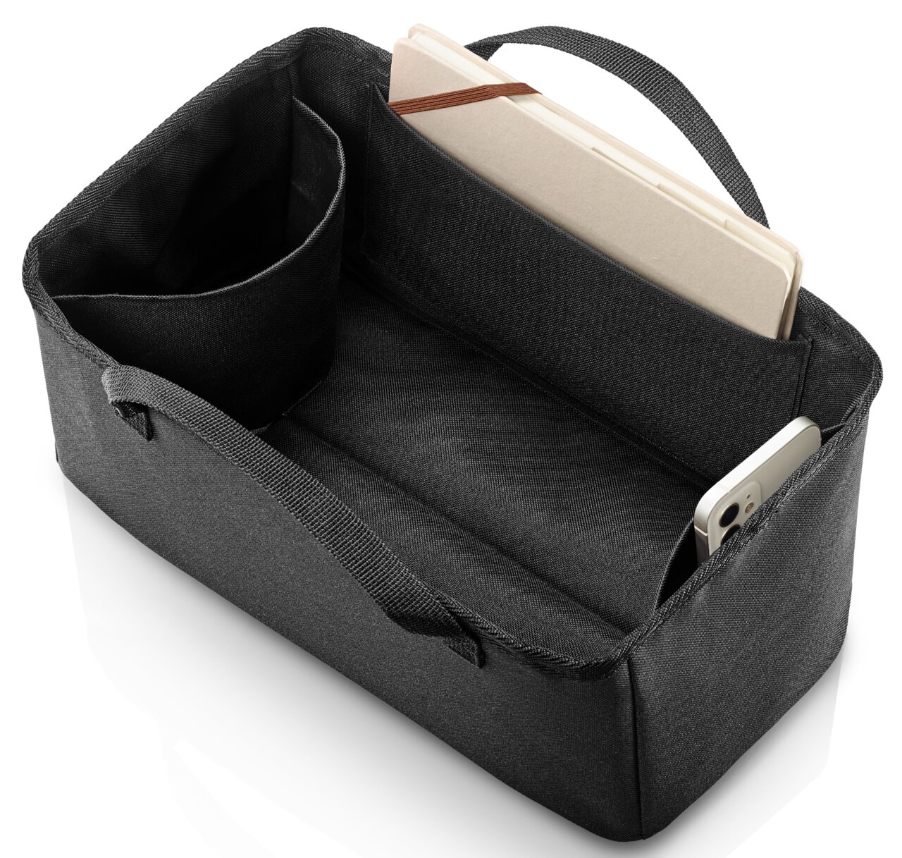 Schwarzer Organizer mit mehreren Fächern, von oben fotografiert, enthält ein Notizbuch und ein Smartphone.
