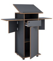 Mobiler Bastel- und Nähschrank auf Rollen in Anthrazit mit Holzdekor-Kanten, mit aufgeklappter Arbeitsplatte, seitlichen Ausklapptischen sowie geöffneter Schublade und Türen, gezeigt in frontaler Dreiviertelansicht von leicht oben vor weißem Hintergrund