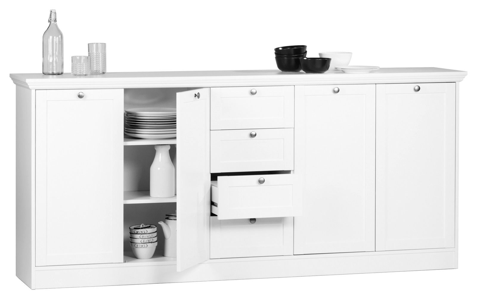 Weißes Sideboard mit mehreren Schubladen und Türen, teilweise geöffnet, gefüllt mit Geschirr, aus frontaler Perspektive.