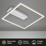 Moderne LED-Deckenleuchte mit quadratischem Rahmen, Sensorfunktion und warmweißem Licht, Perspektive von unten.