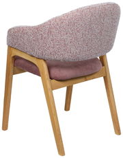 Rückansicht eines Armlehnstuhls mit rosa gepolsterter Sitzfläche und Rückenlehne, Holzbeine