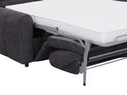 Seitenansicht eines ausgeklappten Funktionssofas mit weißer Matratze und grauem Stoffbezug.