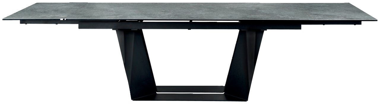 Moderner Esstisch mit grauer Tischplatte und schwarzem, geometrischem Untergestell, seitliche Perspektive