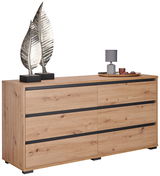 XL-Sideboard aus Holz mit sechs Schubladen, dekoriert mit zwei silbernen Blätterskulpturen und einer Lampe auf einem Tablett, seitliche Perspektive