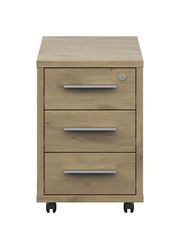 Frontansicht eines Rollcontainers mit drei Schubladen und Holzoptik, auf Rollen.