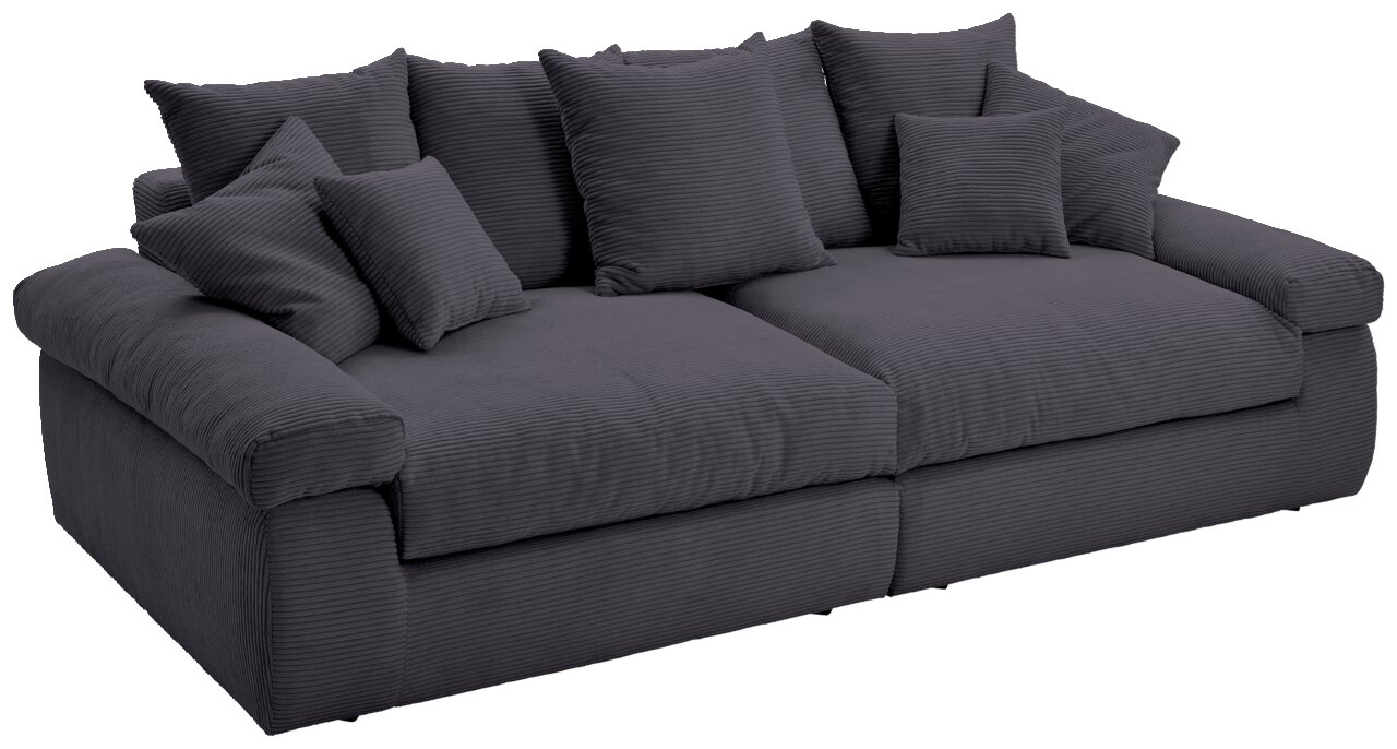 Großes, dunkelgraues Sofa mit mehreren Kissen, seitliche Perspektive