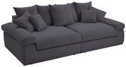Großes, dunkelgraues Sofa mit mehreren Kissen, seitliche Perspektive