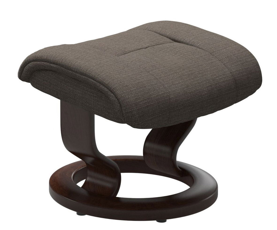 Stressless Kruk RENO Moderner Hocker mit dunkelbraunem Holzgestell und gepolsterter Sitzfläche in seitlicher Perspektive.