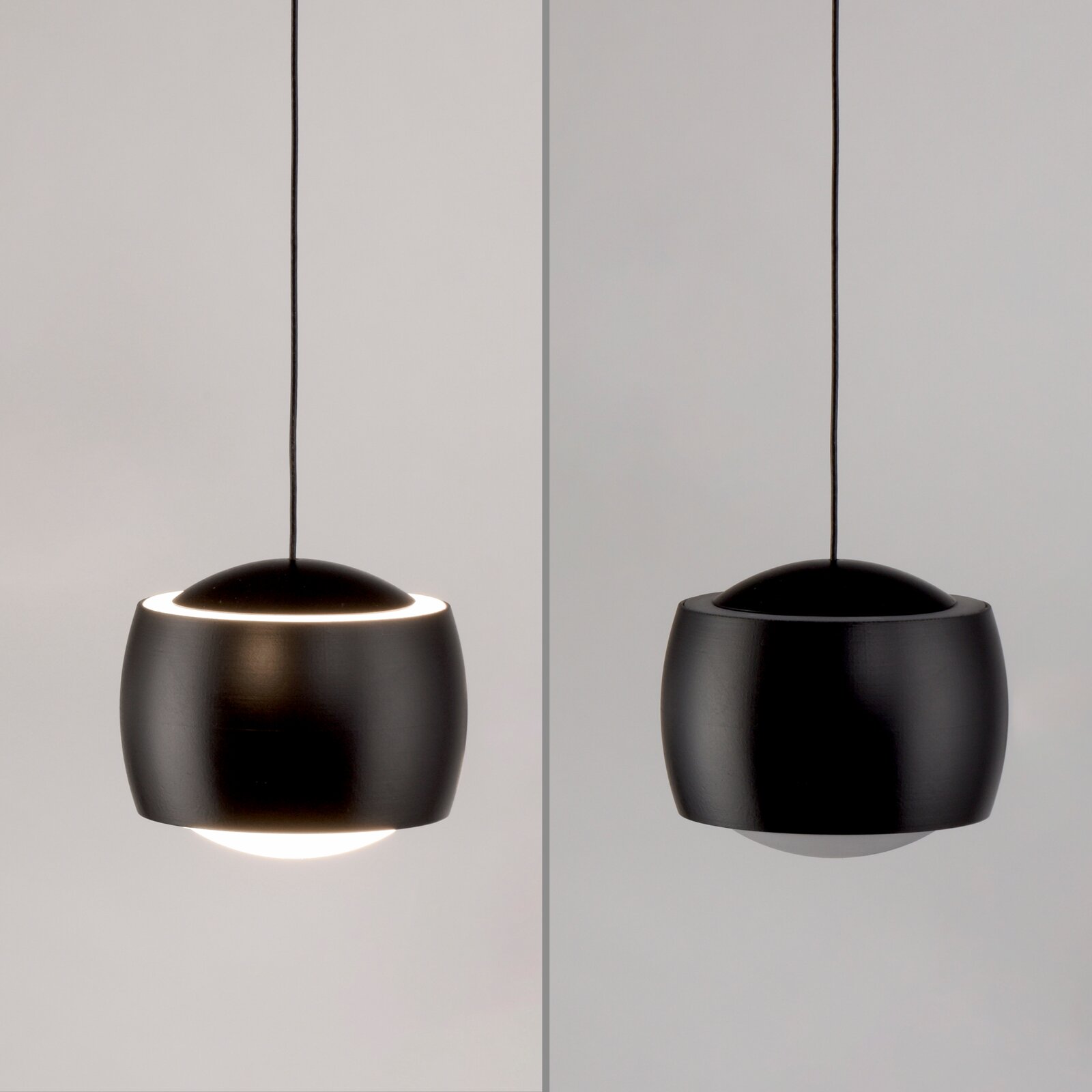 Moderne zwarte hanglamp gezien vanaf de zijkant, met een elegant, rond ontwerp en een zachte lichtspreiding.