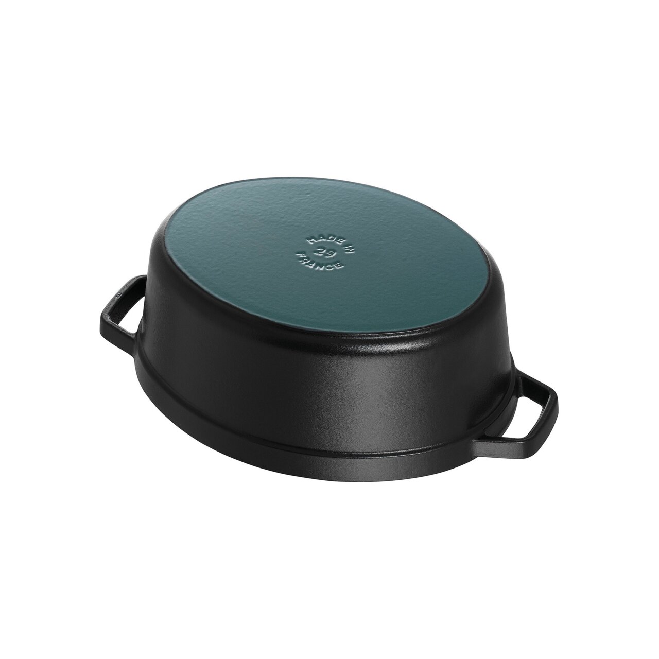 Zwarte ovale braadpan (cocotte) van 29 cm, omgekeerd met zichtbare bodem en handvatten, gezien van onderaf