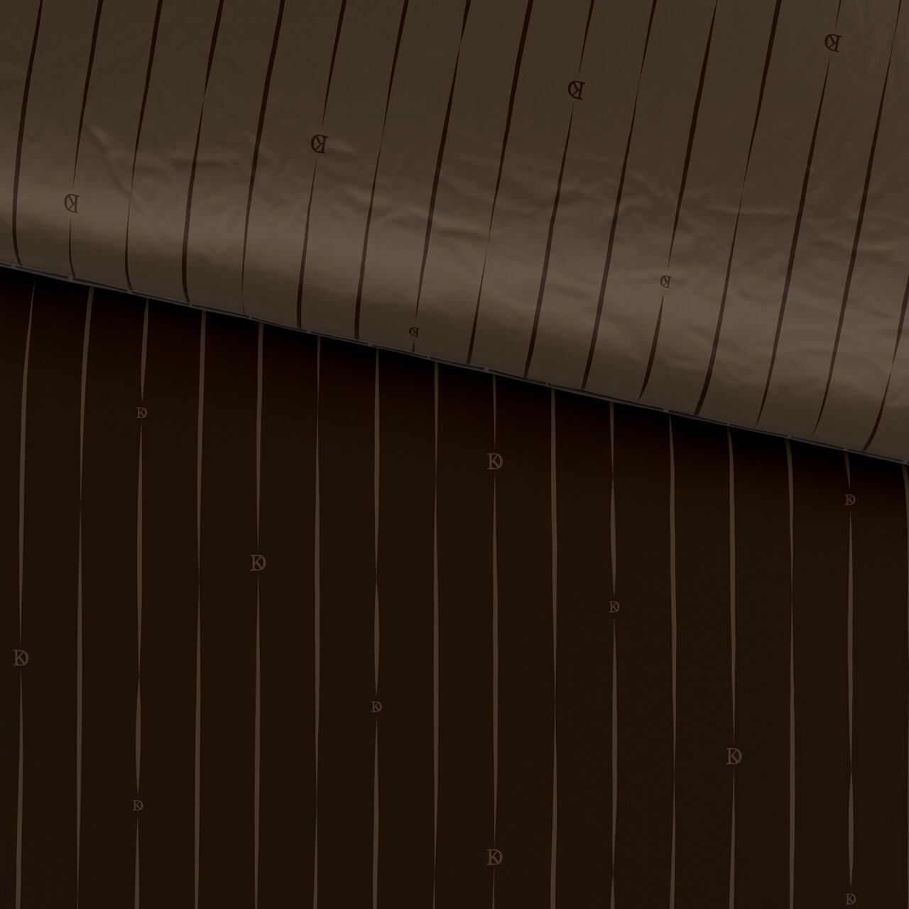 Nahaufnahme einer Wendebettwäsche mit braunen und schwarzen Streifen, von oben betrachtet.