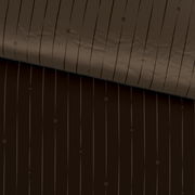 Nahaufnahme einer Wendebettwäsche mit braunen und schwarzen Streifen, von oben betrachtet.