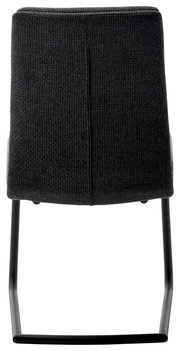 Rückansicht eines Freischwinger-Stuhls mit dunklem Stoffbezug und schwarzem Metallgestell.