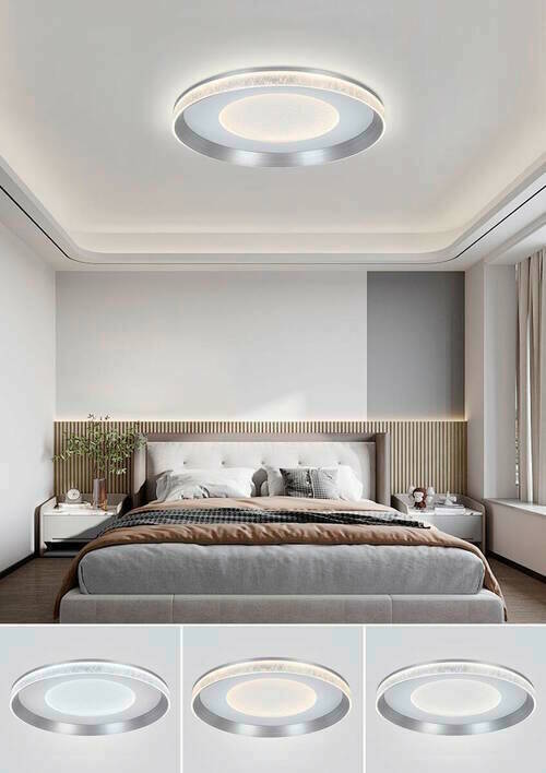 Novel LED-Deckenleuchte Moderne LED-Deckenleuchte in einem stilvollen Schlafzimmer, von unten betrachtet.